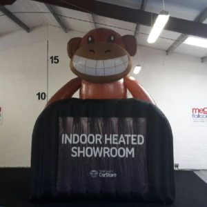Promotional Inflatable mokey with a sign