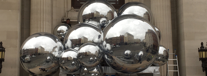 Inflatable mirror-mast sphere