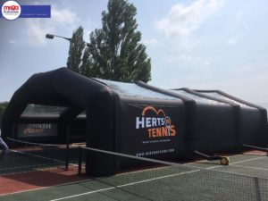 Inflatable tennis court