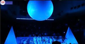 Blue lit giant inflatable sphere