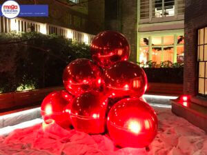 Inflatable red chrome spheres