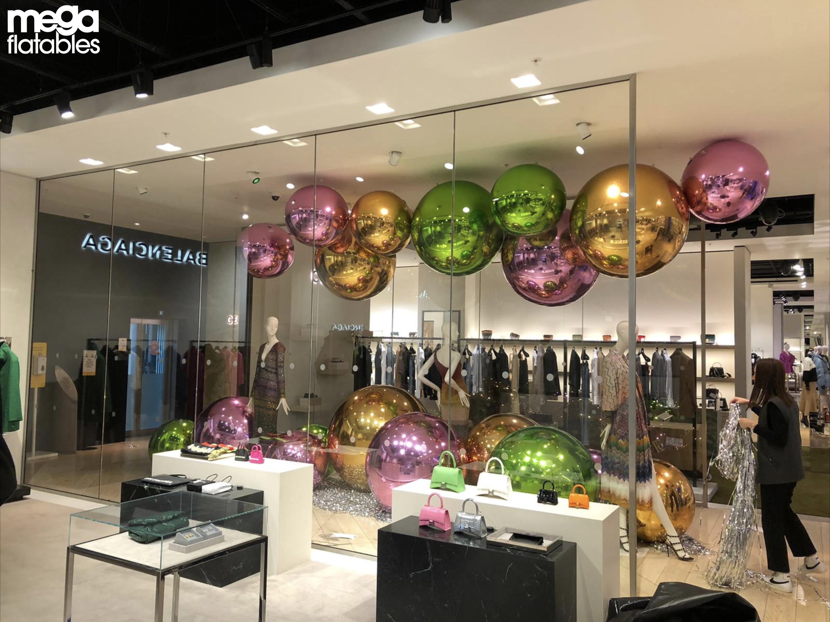 Large baubles on shop floor in Selfridges