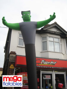 inflatable monster at pizza restaurant