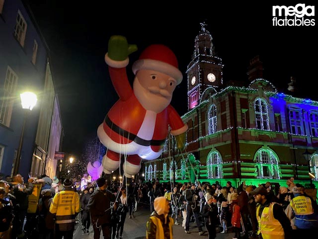 giant inflatable father Christmas parade